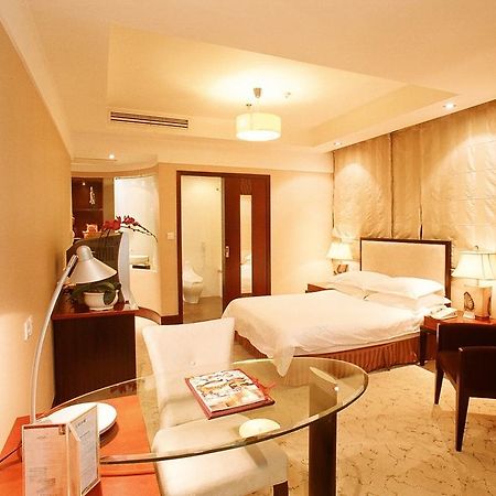 Shanghai Hengsheng Peninsula International Hotel Oda fotoğraf